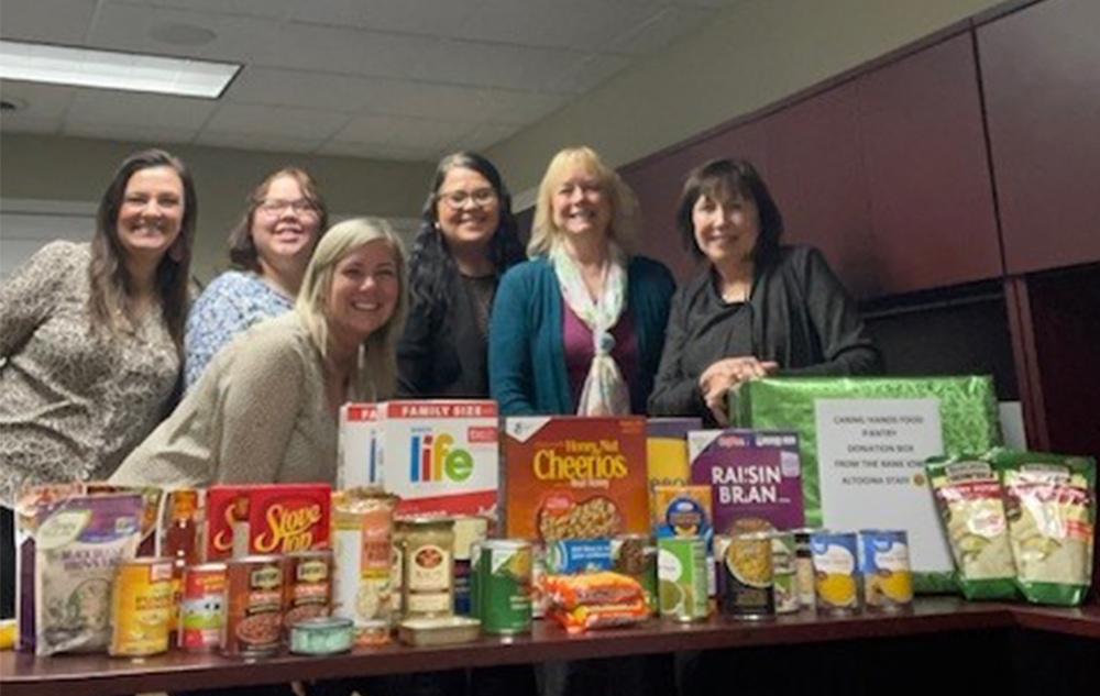 Altoona employees with the food they collected during t