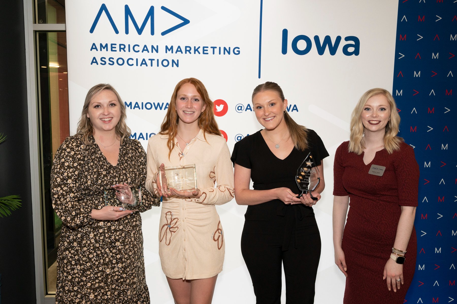 Picture of Bank Iowa Marketing team members accepting A