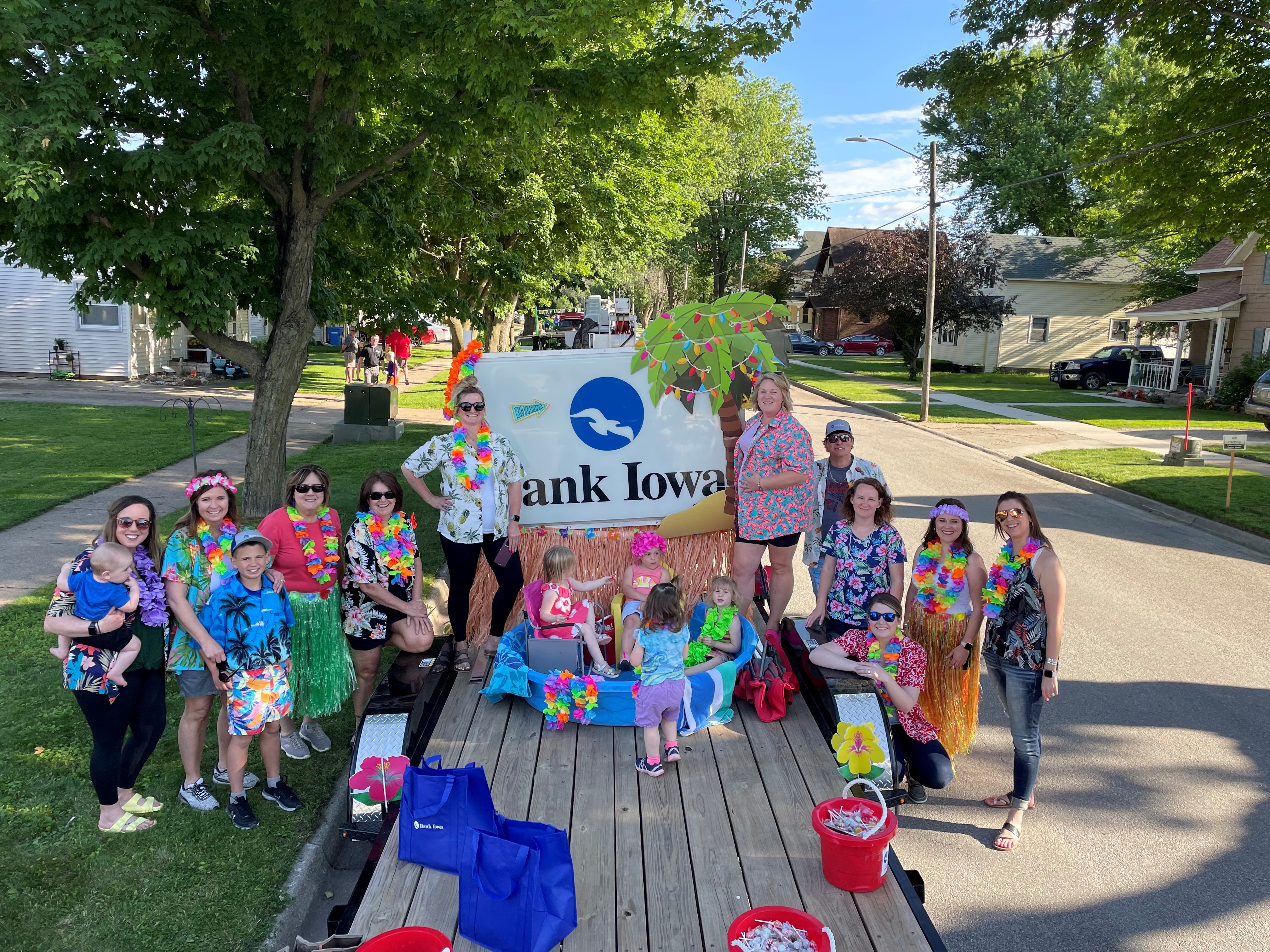 People standing around a parade float